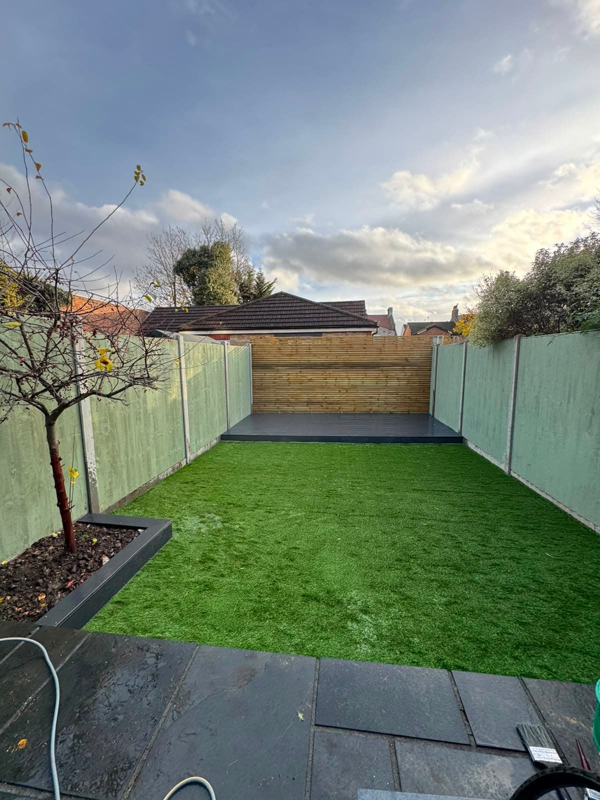 New fencing and freshly laid lawn in a Kingswood garden