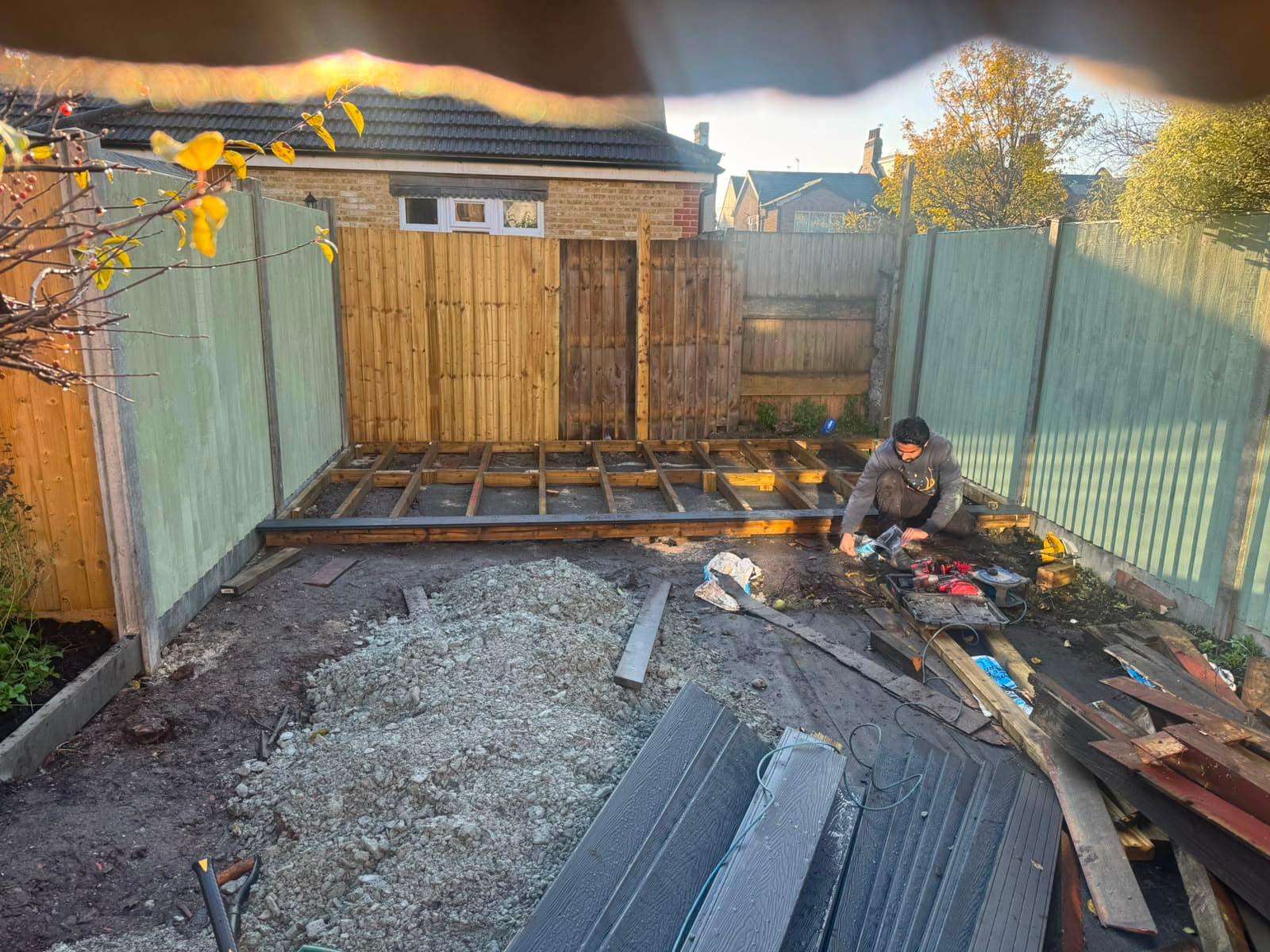 Fencing installed and the ground prepared for turf